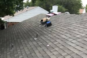 Architectural Shingles being installed on a Highland Village home. We replace roofs in Highland Village and Flower Mound very often.