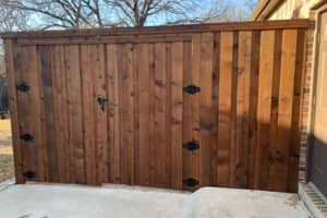 The main front gate of a fence at a home in Denton.