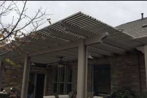 This is a completed pergola we replaced after hail hit it and damaged it. We can do many different types of patio coverings.