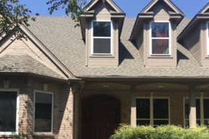 The front of a beautiful home we completed a full roof replacement on. This picture was taken in Denton, Tx.