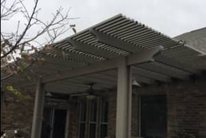 This is a pergola patio cover of a construction project our roofing company completed.